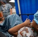 USNS Comfort Personnel Preform Surgery on Patients