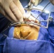 USNS Comfort Personnel Preform Surgery on Patients