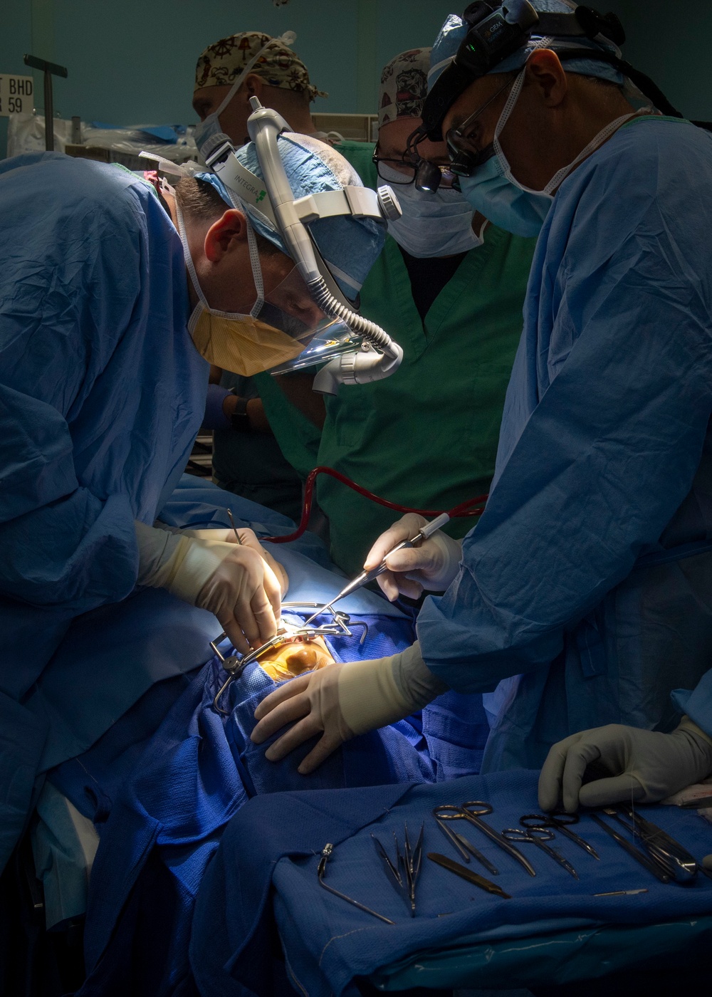 USNS Comfort Personnel Preform Surgery on Patients