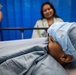 USNS Comfort Personnel Preform Surgery on Patients