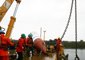 Coast Guard Cutter Bluebell sets a mooring buoy at Tongue Point
