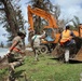 Soldiers clearing debris during Tyhpoon Yutu recovery efforts