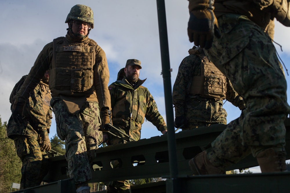 2nd Light Armored Reconnaissance and Norwegian Soldiers Cross Bridge Built by 8th Engineer Support Battalion