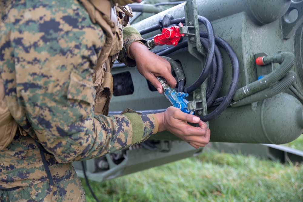 U.S. Marines with 2D Marine Division set up M777A2 Light Towed Howitzer