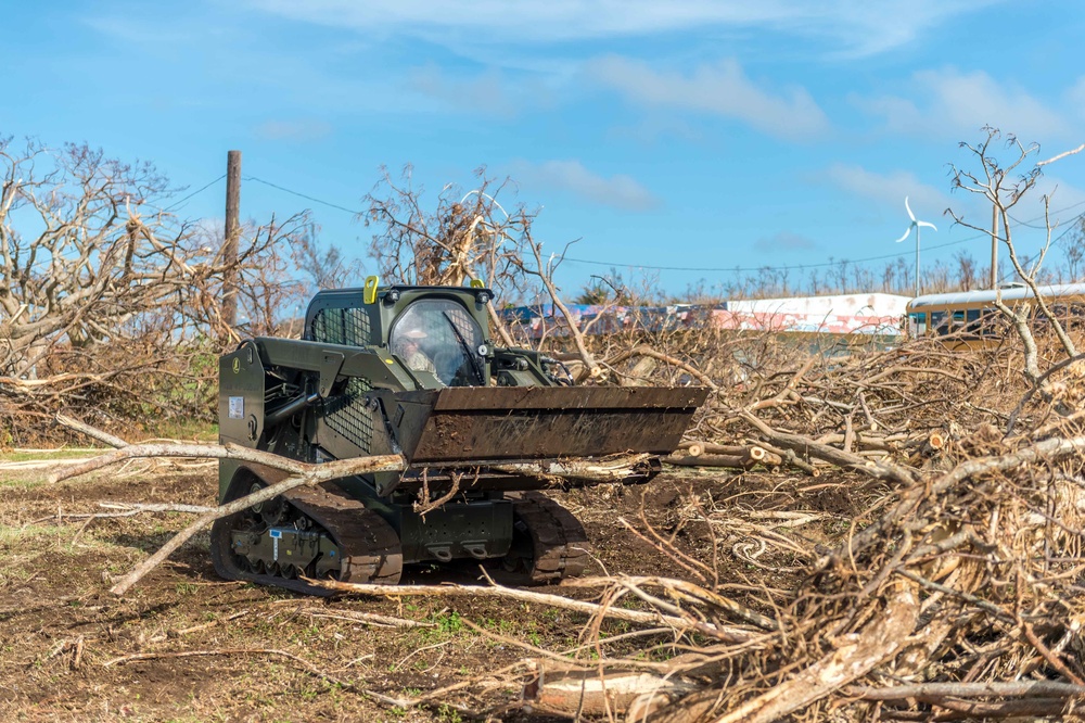 NMCB 1 removes debris from Tinian elementary school, ballpark