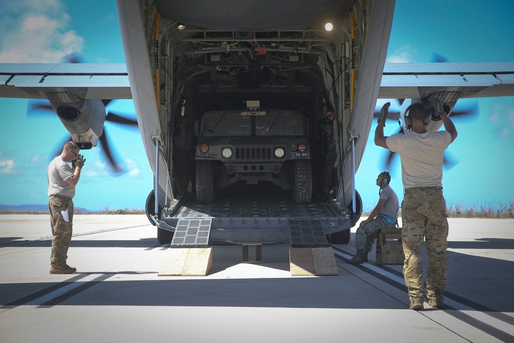 USAF offloading supplies for Saipan