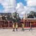 NMCB 1 Offloads Heavy Equipment in Tinian