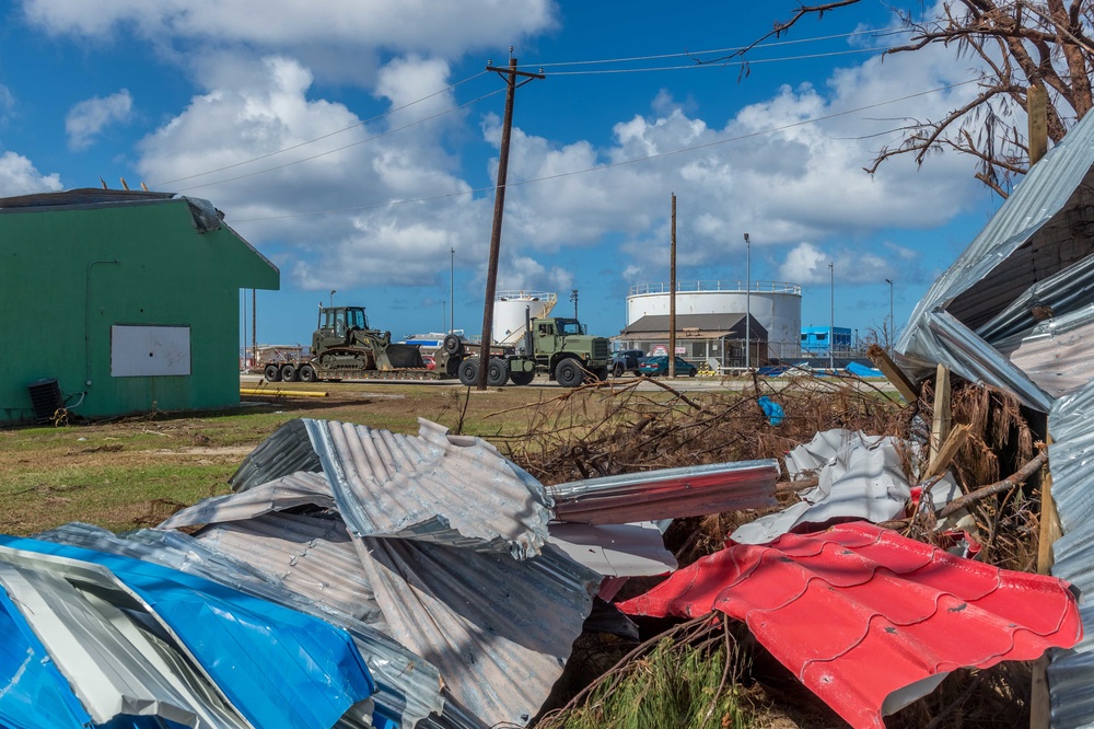 NMCB 1 Offloads Heavy Equipment in Tinian