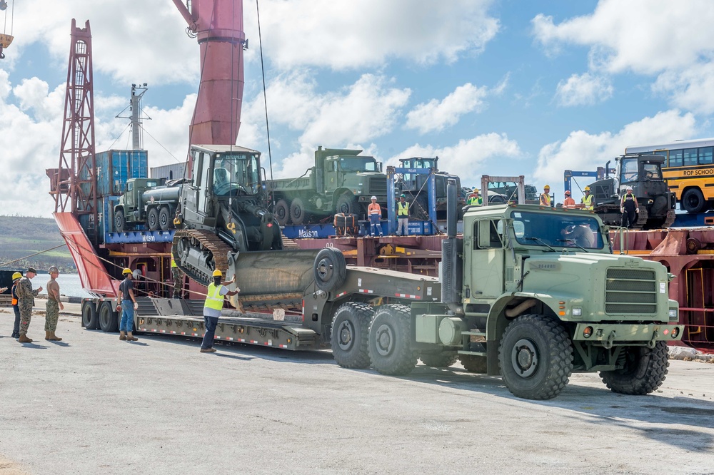 NMCB 1 Offloads Heavy Equipment in Tinian