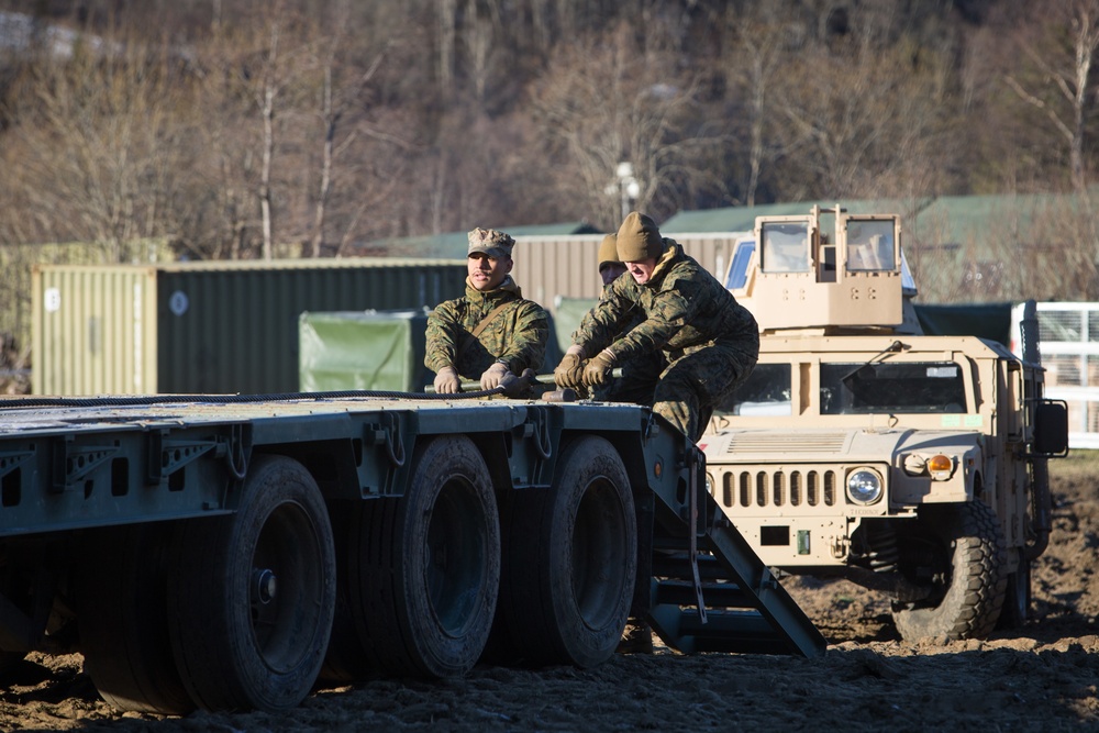 Combat Logistics Battalion 2 Marines Prepare Trucks for a Convoy