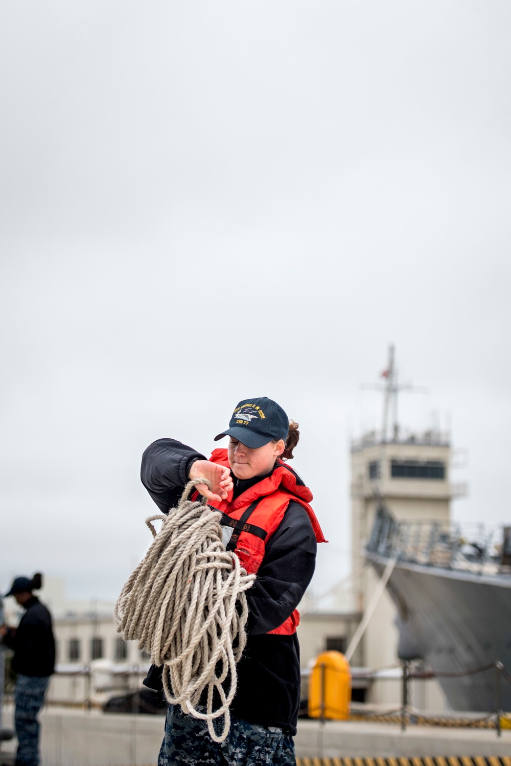 GHWB Sailors Handle Lines for HMS Elizabeth Port Call