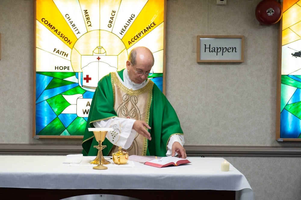 Local Priest Presides Over Mass Aboard USNS Comfort