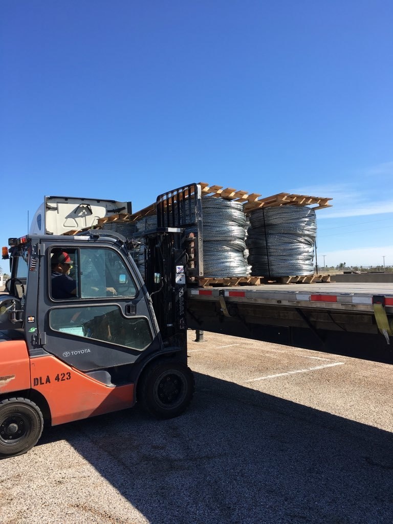 Constantine wire being loaded for transport