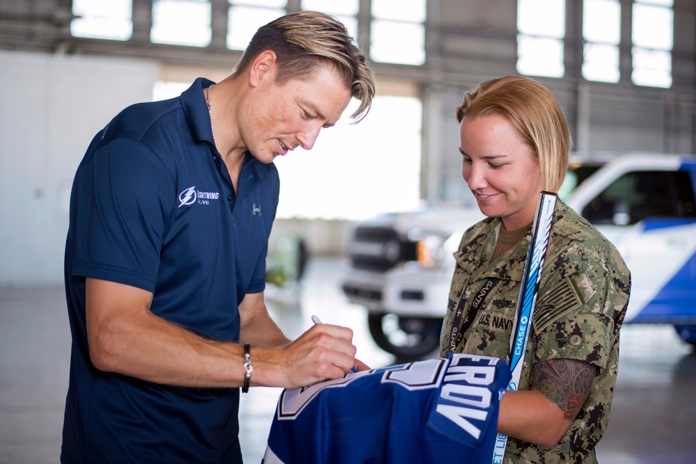 Hangar turned hockey rink: Tampa Bay Lightning, MacDill service members play hockey