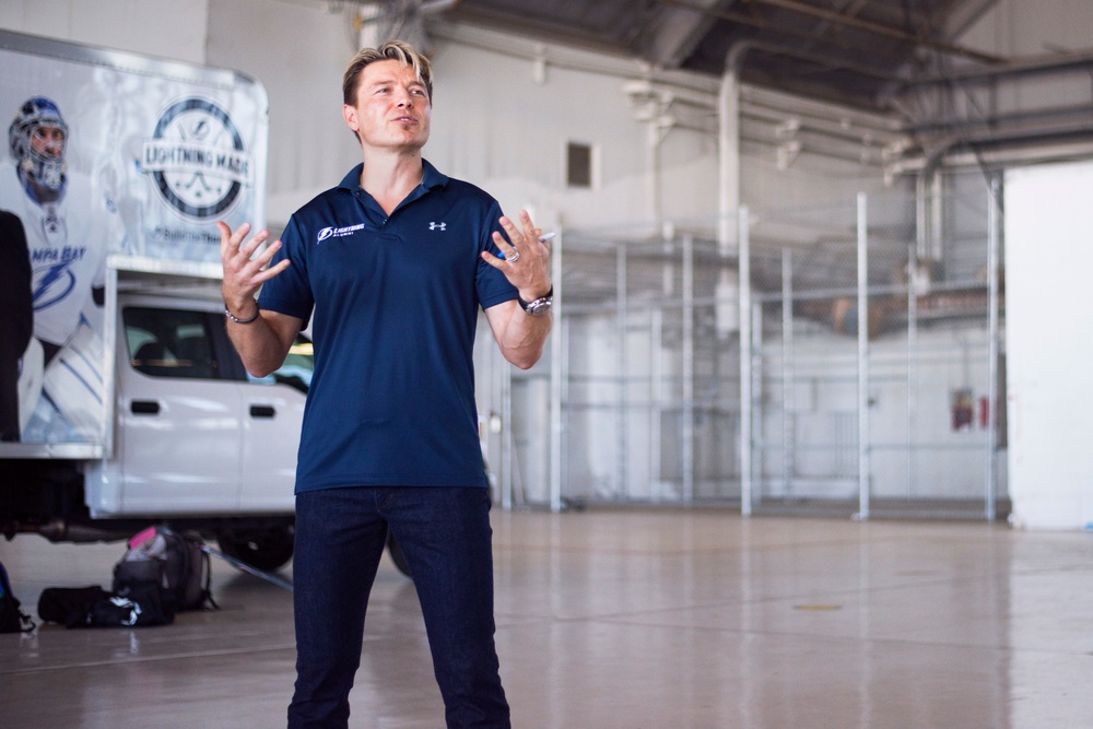 Hangar turned hockey rink: Tampa Bay Lightning, MacDill service members play hockey