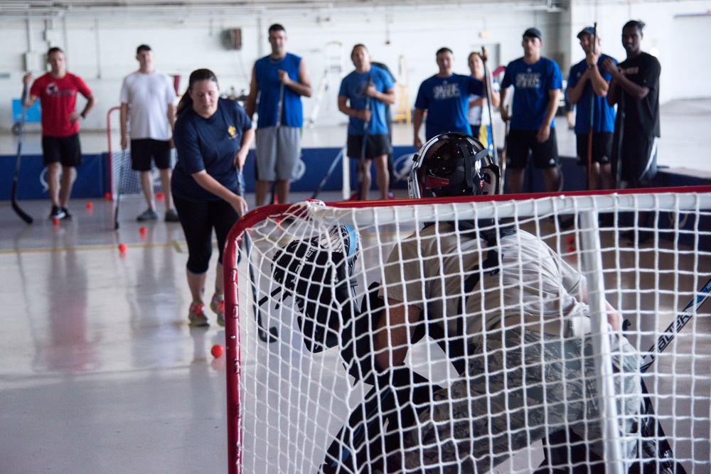 Hangar turned hockey rink: Tampa Bay Lightning, MacDill service members play hockey