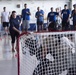 Hangar turned hockey rink: Tampa Bay Lightning, MacDill service members play hockey