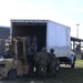 Soldiers load concertina wire on truck for Anzalduas International Bridge