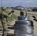Soldiers unravel concertina wire for Anzalduas International Bridge