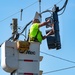 Linesmen Work To Restore Power After Hurricane Michael