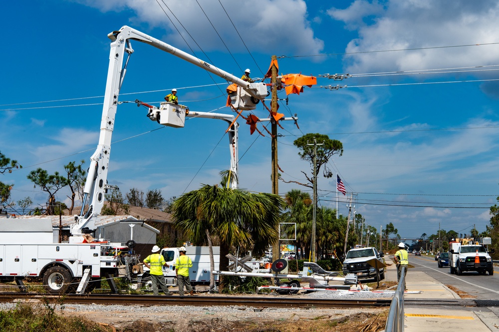Linesmen Work To Restore Power After Hurricane Michael