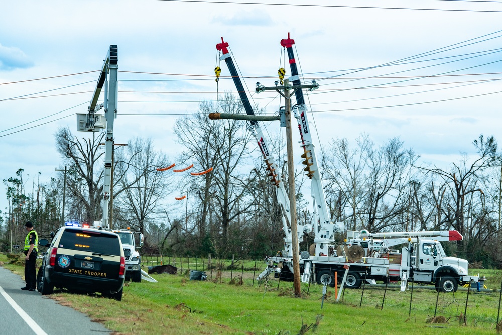 Linesmen Work To Restore Power After Hurricane Michael