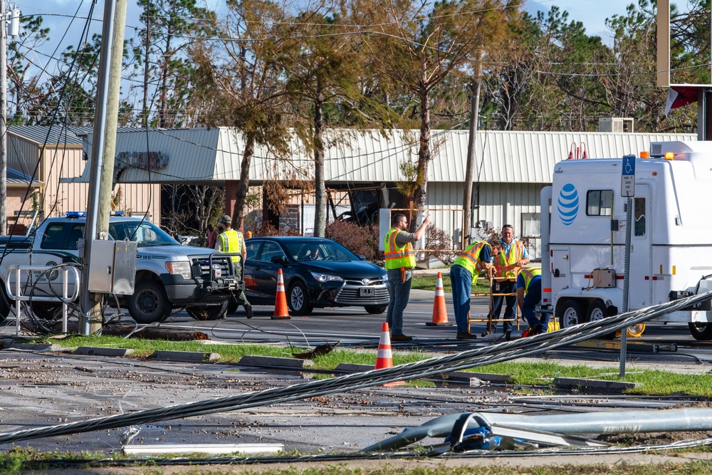 Workers Restore Communications After Hurricane Michael