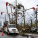 Linesmen Work To Restore Power After Hurricane Michael
