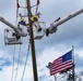 Linesmen Work To Restore Power After Hurricane Michael