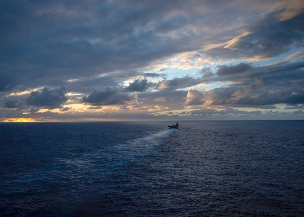 The Nimitz-class aircraft carrier USS John C. Stennis (CVN 74) steams through the Pacific Ocean.