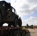 Soldier removes Humvee from trailer