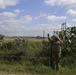 Soldier installs concertina wire