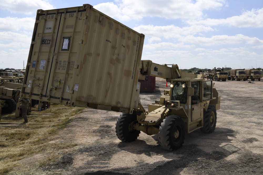 Soldier moves supply container