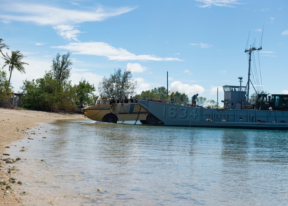 USS Ashland, Naval Beach Unit 7 and Guam Army National Guard work together in support of Super Typhoon Yutu relief.