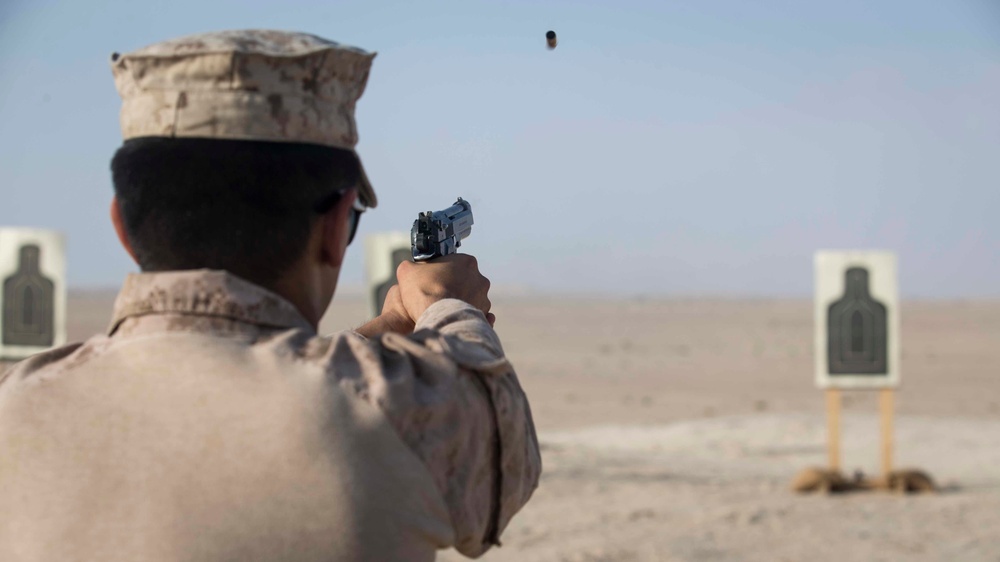 CLB-13 practices pistol shooting