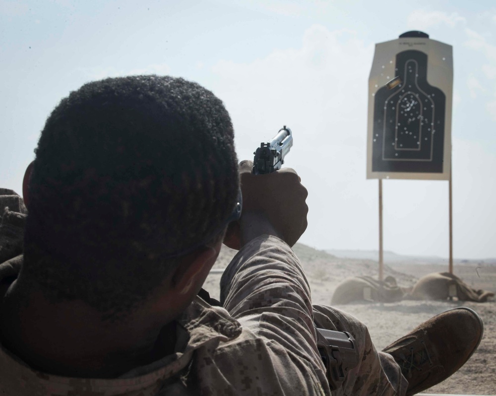 CLB-13 practices pistol shooting