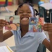 Maxwell-Gunter volunteers teach local youth the importance of financial literacy