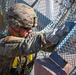 104th Engineer Construction Company install concertina wire in