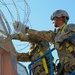104th Engineer Construction Company install concertina wire