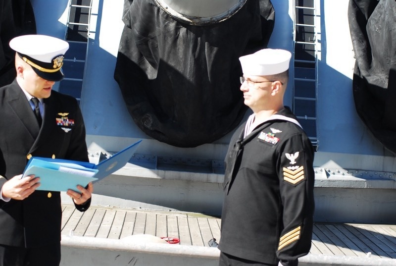 Naval Museum hosts a re-enlistment ceremony for VAW-123