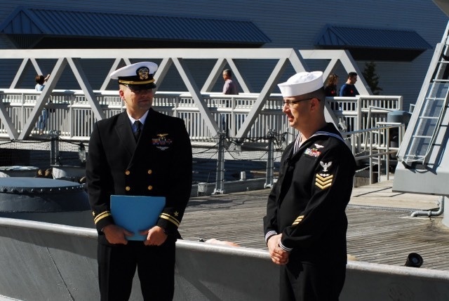 Naval Museum hosts a re-enlistment ceremony for VAW-123