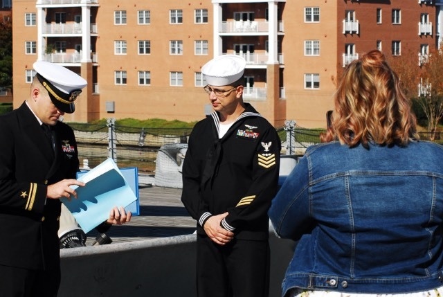 Naval Museum hosts a re-enlistment ceremony for VAW-123