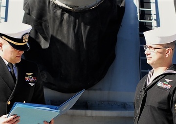 Naval Museum hosts a re-enlistment ceremony for VAW-123