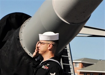 Naval Museum hosts a re-enlistment ceremony for VAW-123