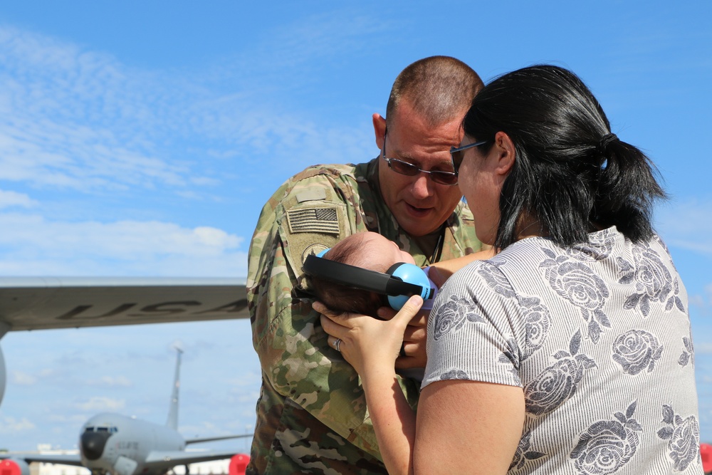 Deployed Airman Returns Home to Meet First Child