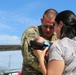 Deployed Airman Returns Home to Meet First Child