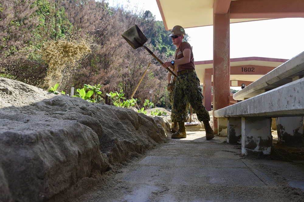 NMCB-3 Seabees Remove Displaced Sand Onboard White Beach Naval Facility