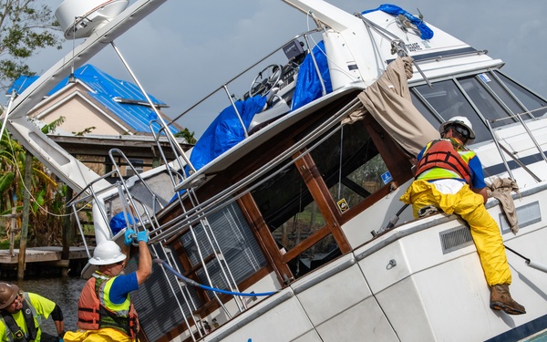 U.S. Coast Guard Begins Process Of Removing Damaged Boats