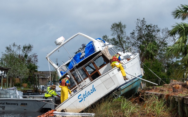U.S. Coast Guard Begins Process Of Removing Damaged Boats