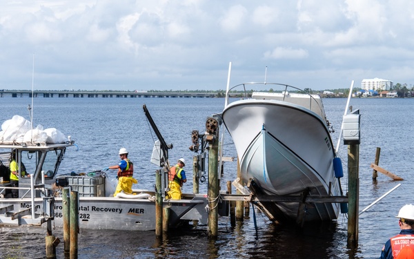 U.S. Coast Guard Begins Process Of Removing Damaged Boats